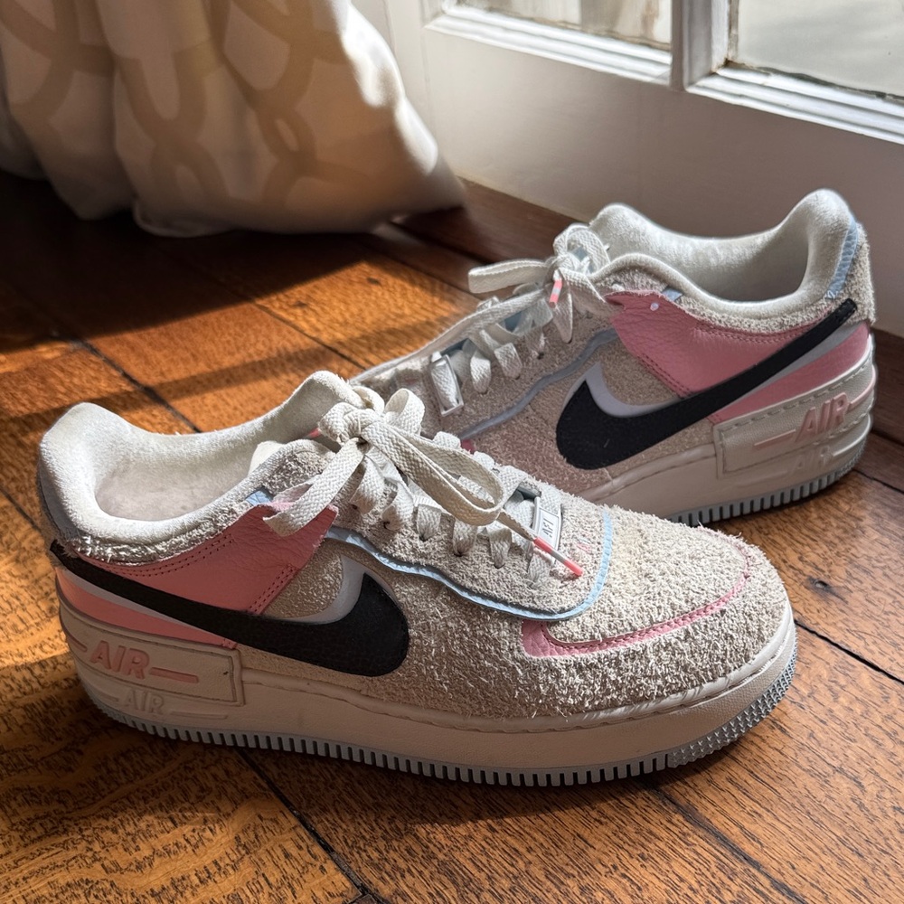 Nike Air Force 1 Low in gray, Pink, and Black